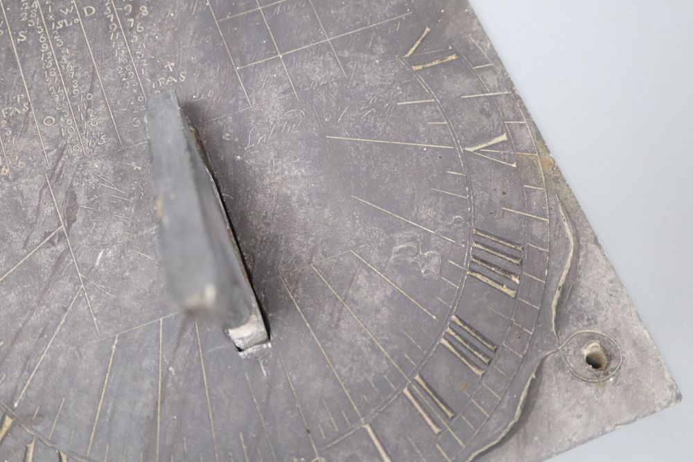 An 18th century slate sundial bearing solar calculations